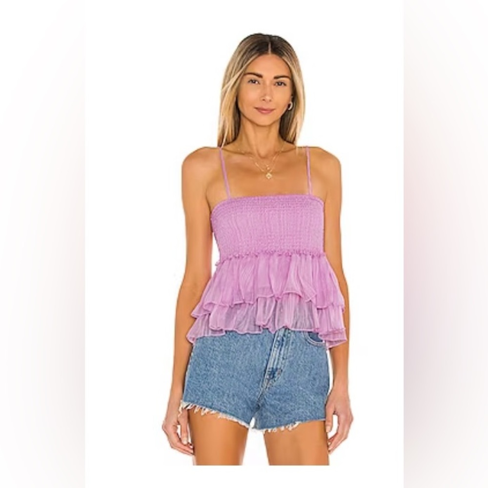 Cute purple top. Never worn. Very flattering.